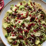 Shaved Brussels Sprout Salad with Pomegranate and Candied Pecans