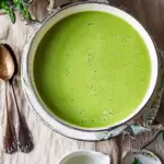 creamy asparagus soup with fennel and tarragon in a bowl