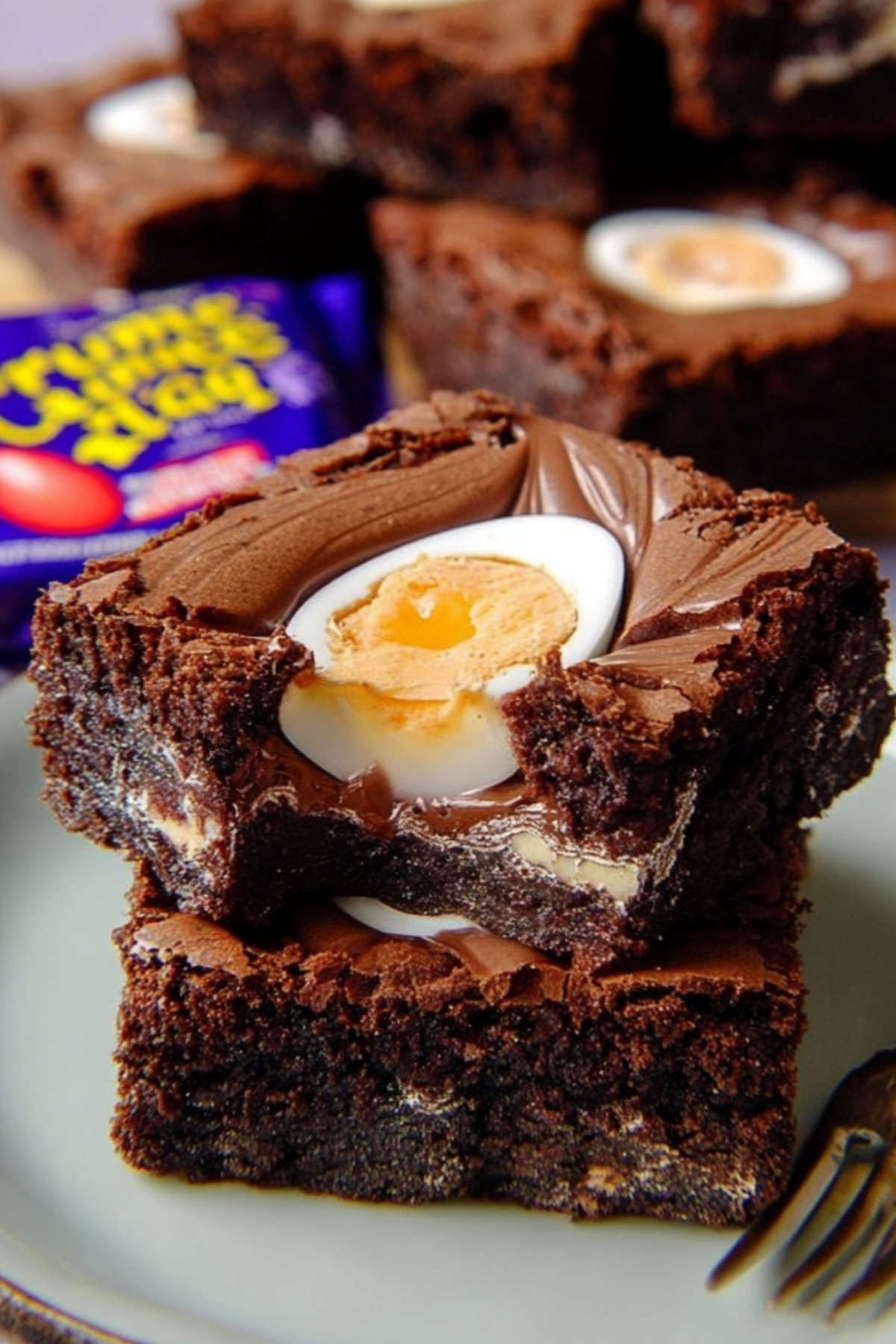 Creme Egg Brownies with gooey chocolate center and fudgy texture