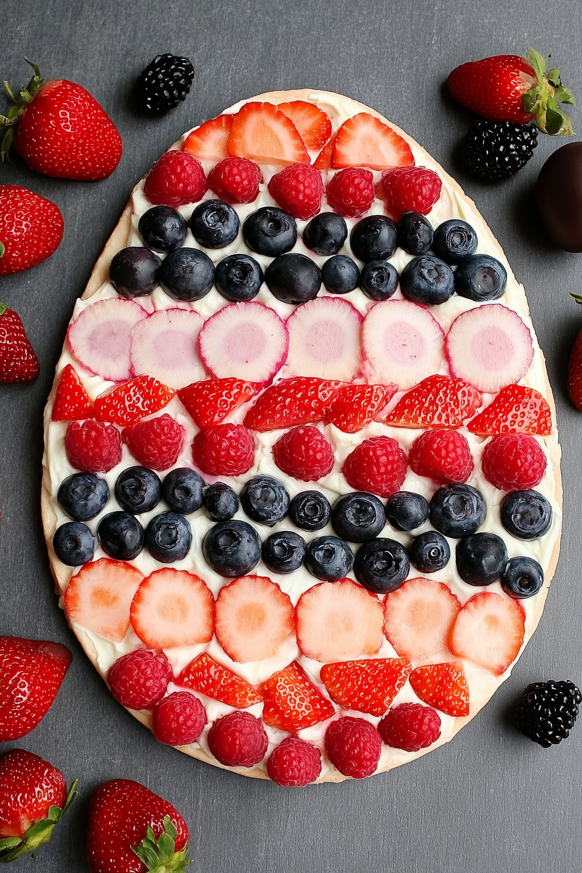 Easter Egg Fruit Pizza with vibrant fruits and creamy frosting