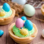 Easter Sugar Cookie Cups with colorful frosting and Easter egg candies