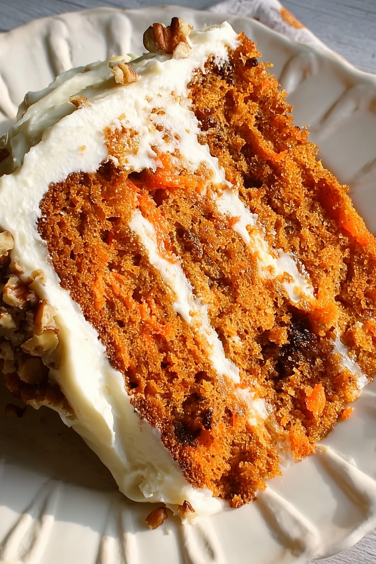 Eggless Carrot Cake with cream cheese frosting and walnuts