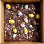 Fudgy Cadbury Egg Brownies with gooey chocolate center and mini eggs