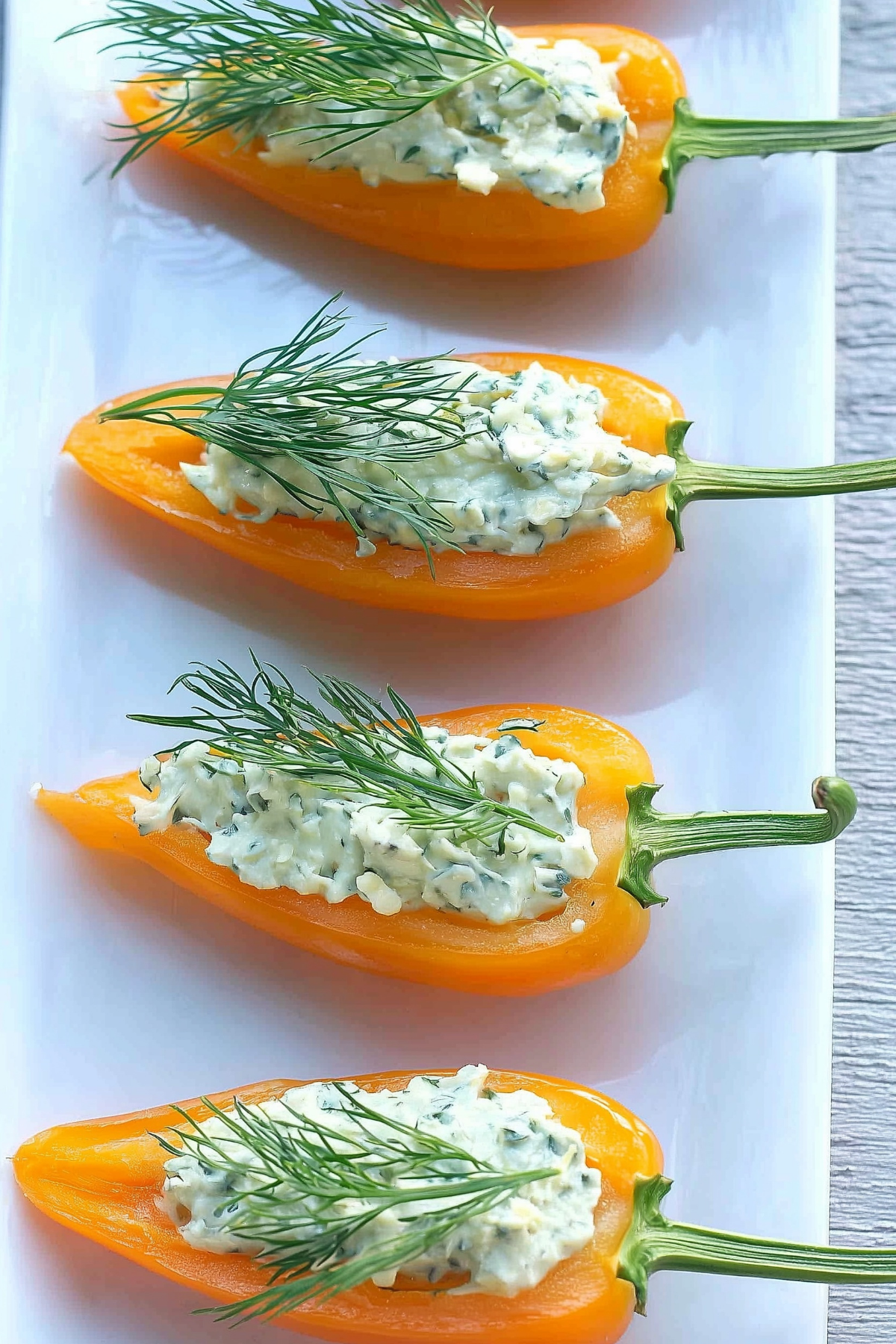 Mini 'Carrot' Peppers stuffed with creamy herb filling