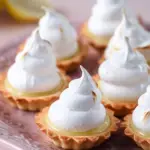 Mini Lemon Meringue Tarts with meringue topping and lemon filling