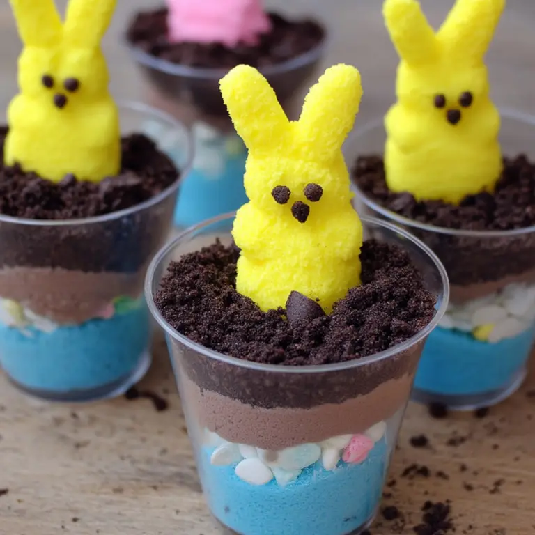 PEEPS Easter Bunny Dirt Cups with chocolate pudding, crushed Oreos, and colorful decorations