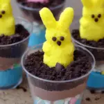 PEEPS Easter Bunny Dirt Cups with chocolate pudding, crushed Oreos, and colorful decorations