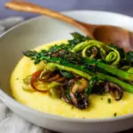 Creamy Polenta with Spring Veggies served with fresh herbs and gremolata