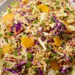 Ramen noodle salad with fresh vegetables and crunchy toppings