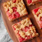 Freshly baked rhubarb oatmeal bars with crumbly topping