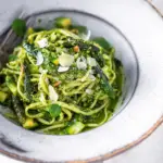 Spring Pasta with Nettle Pesto served with fresh lemon zest and pine nuts