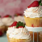 Strawberry Filled Cupcakes with fresh strawberry center and creamy frosting
