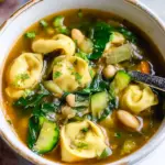 Vegetarian Tortellini Soup with spinach and white beans in a bow