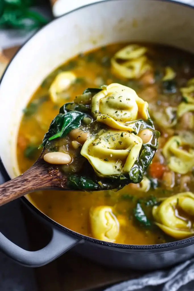 Vegetarian Tortellini Soup with spinach and white beans in a bow